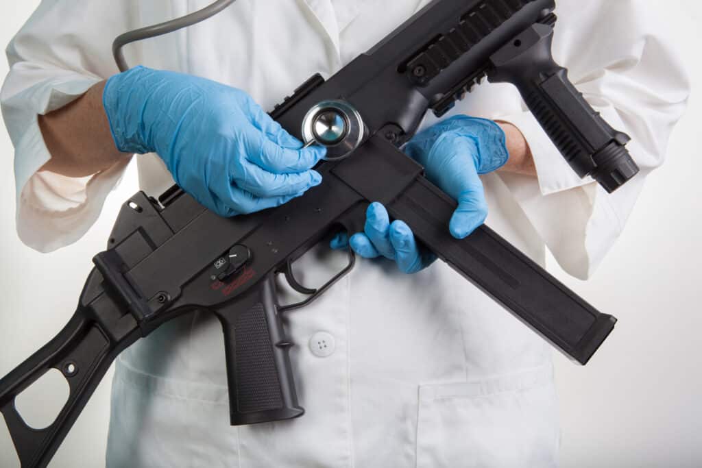 Nurse with Sub machine gun